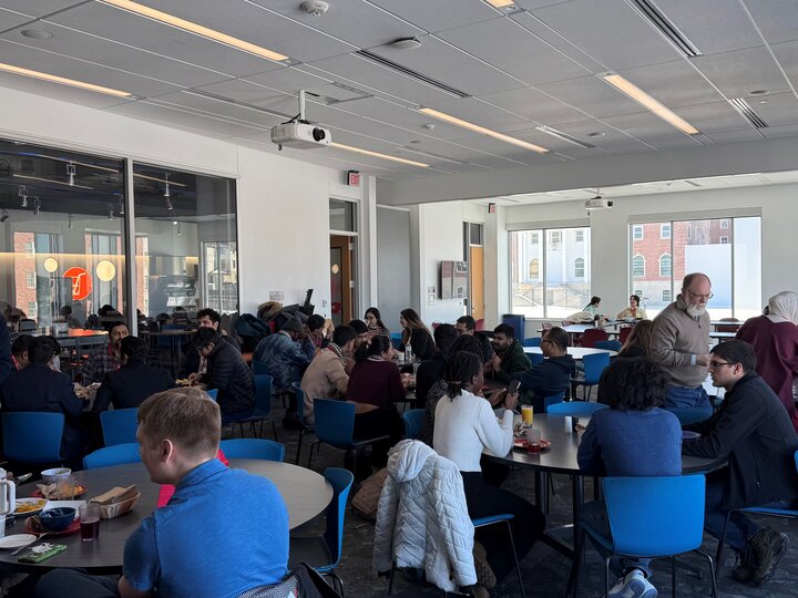 Graduate students at a luncheon social for the 2024 Symposium
